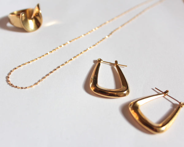 Gold hoop earrings, statement gold ring, dainty gold necklace 