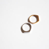 Two gold rings on a white background, signet  design (Waterproof and hypoallergenic) 