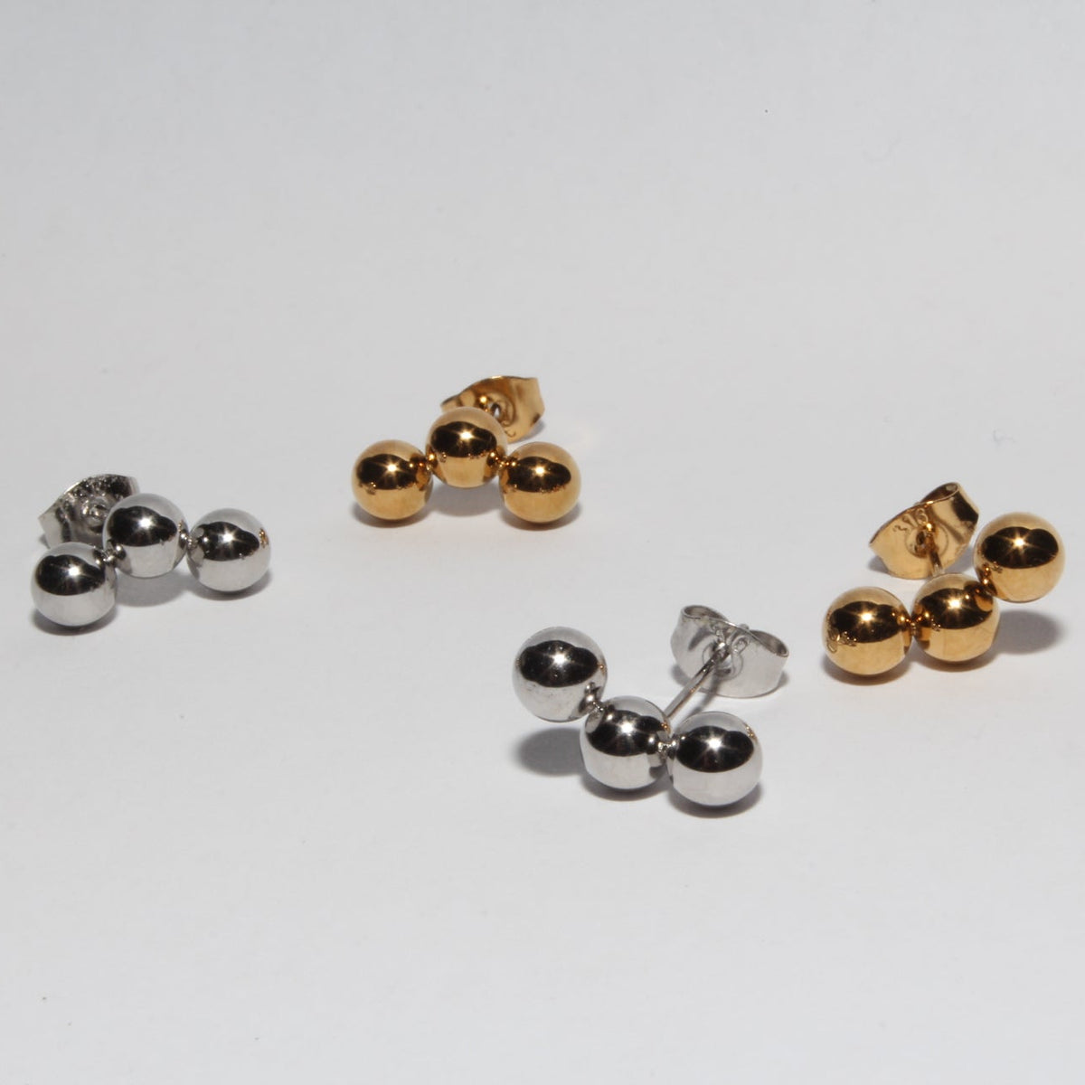 Fuwa collections triple balls stud earrings gold and silver. minimalist style 