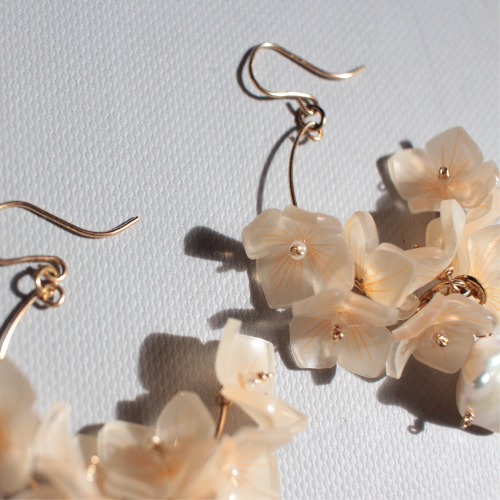 Handmade Japanese Ajisai Hydrangea Earrings by Lilyna, featuring gold-filled hoops with a delicate flower petal design and a drop of freshwater pearl, perfect for sensitive skin and bridal scenes.