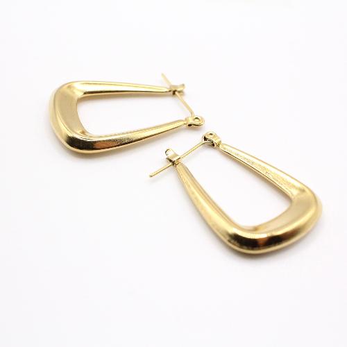 Close up of 24k gold plated hoop earrings with minimalist and bold design, perfect for everyday wear.