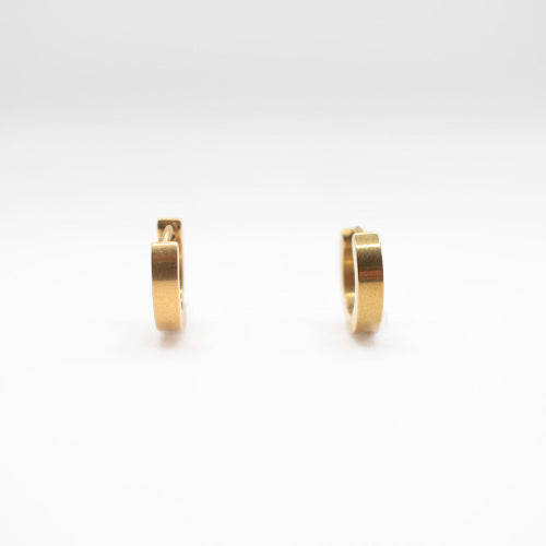 a pair of one touch hoop earrings 24k gold plated. showcasing their minimalist elegant design 