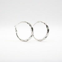 Rhodium plated silver twist hoop earrings for daily wear 