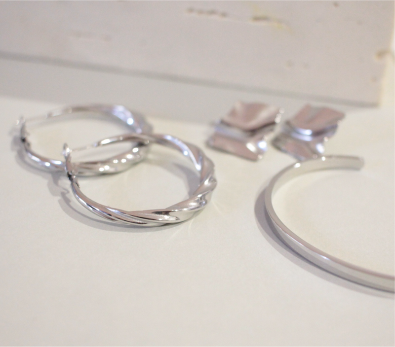 Rhodium plated silver twist hoop earrings for daily wear 