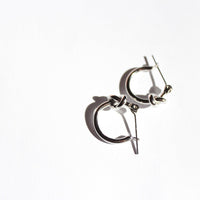 Rhodium plated knot hoop earrings 