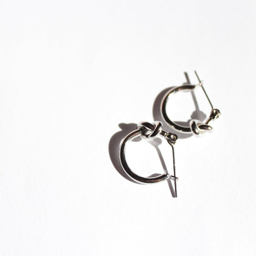 Rhodium plated knot hoop earrings 