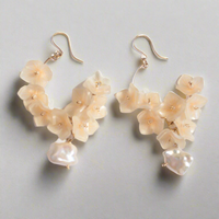 Handmade Japanese Ajisai Hydrangea Earrings by Lilyna, featuring gold-filled hoops with a delicate flower petal design and a drop of freshwater pearl, perfect for sensitive skin and bridal scenes.