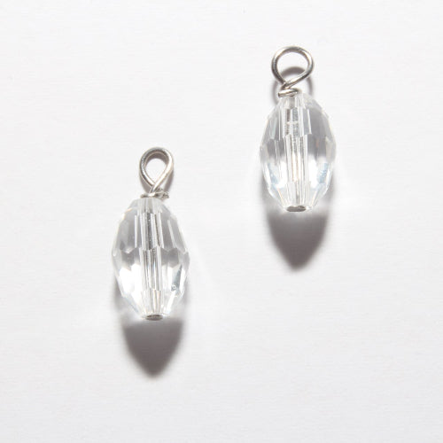 Two clear faceted bead charms with silver-toned loops, displayed on a plain white background with soft shadows.