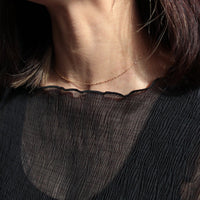 Mum model wears handmade necklace 