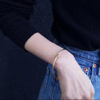 Dainty knot cuff bangle 24k gold plated for daily wear. Japanese minimalist design, waterproof and sensitive skin friendly. Gift for mum