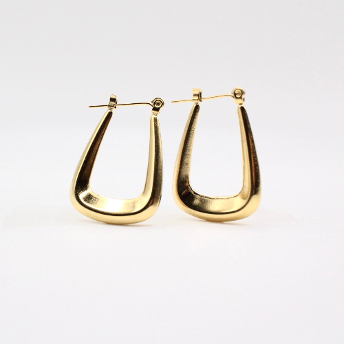 Closed up of 24k gold plated hoop earrings with minimalist and bold design, perfect for everyday wear.