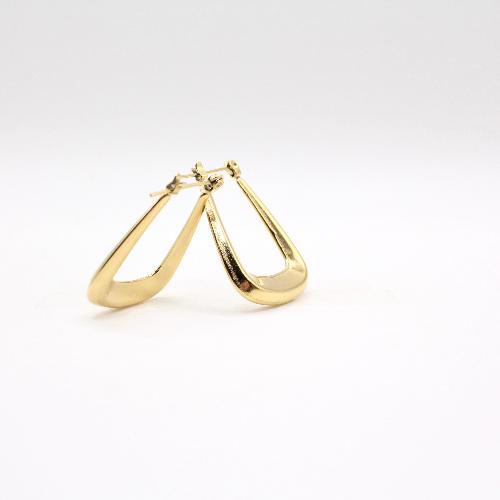 Closed up of 24k gold plated hoop earrings with a minimalist and bold design, perfect for everyday wear. 